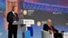 Владимир Путин и Дмитрий Саймс на пленарной сессии ПМЭФ-2023