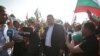 Депутатът от ДПС Делян Пеевски по време на протеста срещу правителството на Кирил Петков. Привържениците на движението бяха докарани за събитието в София с автобуси от цялата страна