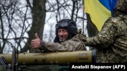 Українські військовослужбовці в зоні бойових дій на Харківщині. Фото пресслужби Сухопутних військ України, що було оприлюднене 19 квітня 2022 року