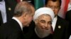 رجب طیب اردوغان در کنار حسن روحانی،اجلاس سازمان همکاری های اسلامی، استانبول