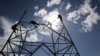 Afghanistan -- Afghan electricity workers set up electricity poles in the Padkhab district of the Logar province, February 20, 2015