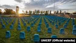 UNICEF laid kids' backpacks on the lawn near its building in New York in neat rows reminiscent of a graveyard as a public reminder of how many children die in "violent conflicts" each year.