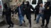 Armenia - Zhirayr Sefilian (L) and another detained leader of the Founding Parliament movement are taken to the Investigative Committee for further questioning, Yerevan, 9Apr2015.